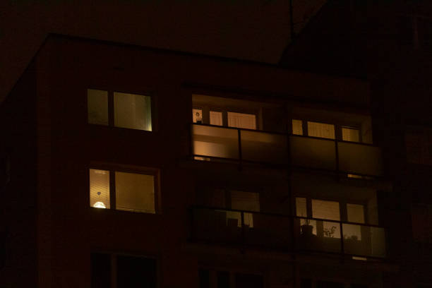 istock A tall building that has numerous windows is beautifully lit up at night 2197966896