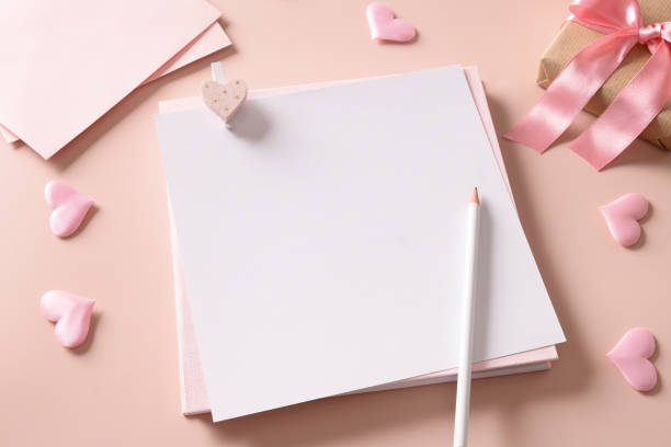 istock Valentine's day mock up for letter with empty blank and pink hearts, gift. Greeting card 2197967484