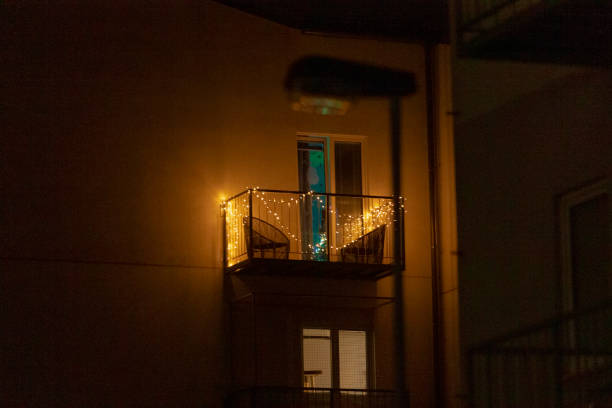 istock A balcony decorated with sparkling Christmas lights shines at night 2197967905