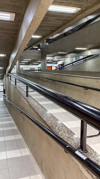 istock Access ramps in concrete building forming diagonal lines 2197973761