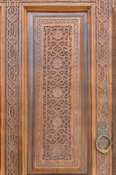 istock Wooden door with floral pattern 2197975693