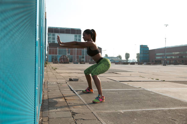 Fit woman exercising outdoors.