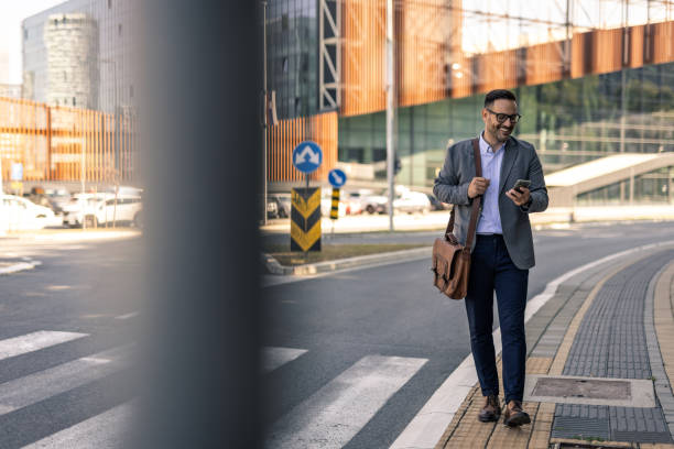 istock Businessman on his way to work, walking through the city 2197982736
