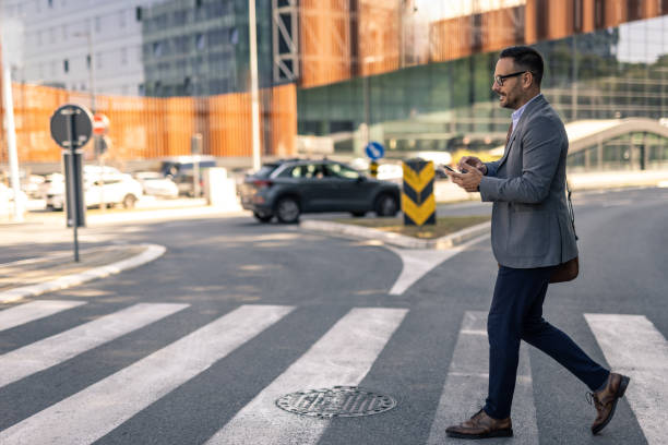 istock Businessman on his way to work, walking through the city 2197982820
