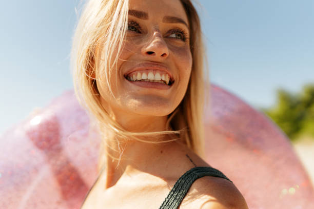 Happy woman at the beach