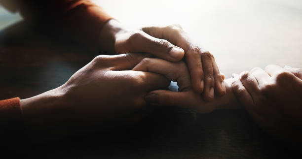 istock Couple, holding hands and empathy on table at house for compassion, partnership and consoling of depression. People, support and comfort with relationship crisis, partner trust and loyalty connection 2197989304