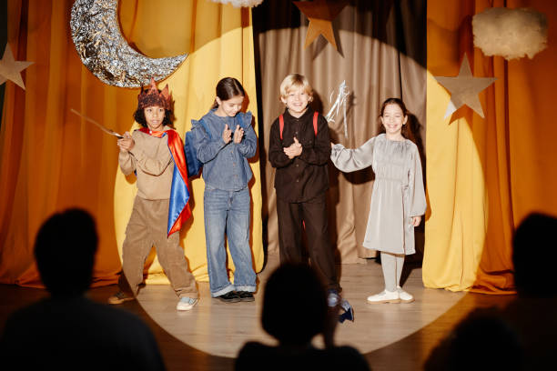 istock Kids Performing On Stage In Bright Costumes 2197989697