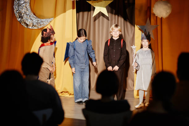 istock Children Performing in School Play on Stage 2197989699