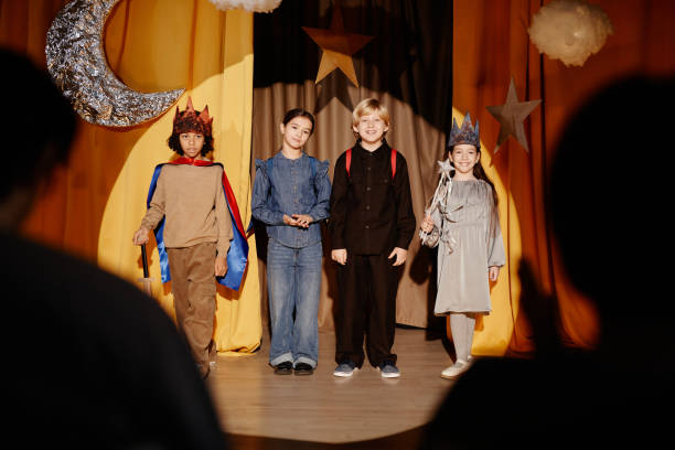 istock Children Performing on Stage During School Play 2197989717