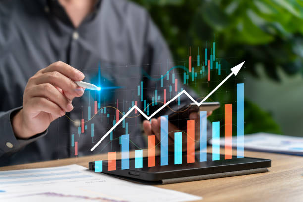 istock Business growth and investment analysis concept,Businessman use tablets, Digital tools Analyze financial data of company,Marketing targets,Development to achieve  investment  goals,Success strategies 2197989888