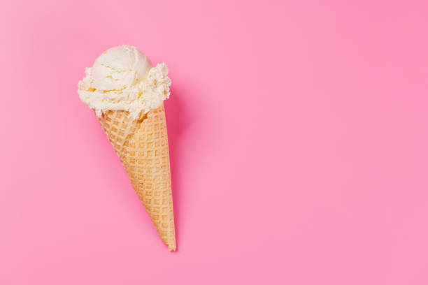 istock A refreshing ice cream cone set against a vibrant pink background 2197991248