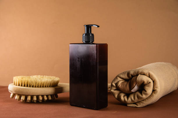 istock Soap dispenser on beige background close up 2197991404