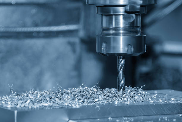 istock The hole drilling  process on NC milling machine with aluminum parts. 2197991477