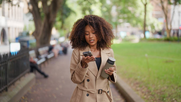 istock Fashionable Young Businesswoman Using an AI App While Commuting 2197991844