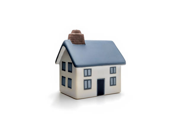 istock Small White Dream Home Toy House with Chimney, Isolated on White Background 2197994800