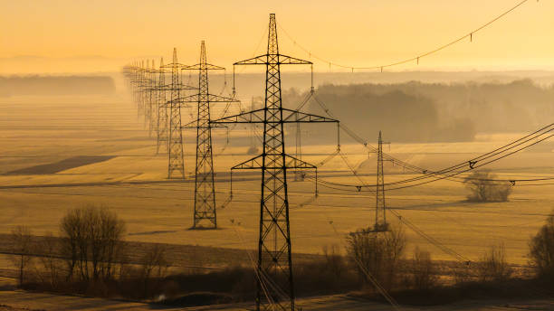 istock Majestic Power Lines Across Sunrise Landscape 2198004622