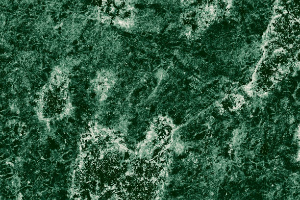istock Real closeup of dark green marble stone texture surface background. Design pattern with high resolution for luxury home decoration. Abstract matt slab rock material. Front view of natural tiles stone surface. 2198008084