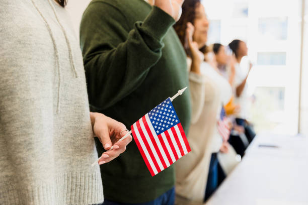 istock Pledge of Allegiance: Diverse Group of Americans Showing Patriotism 2198009042