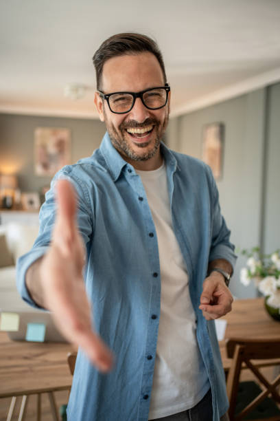 istock Portrait of a young modern man in a comfortable home office looking at the camera 2198009217