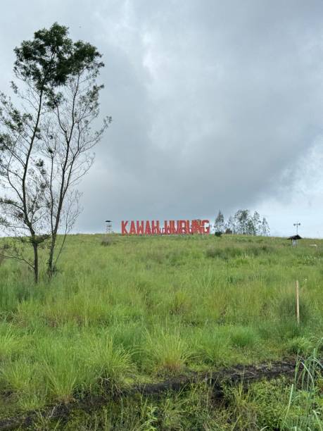 istock Kawah Wurung Hills with Iconic Sign Under Cloudy Sky 2198010882