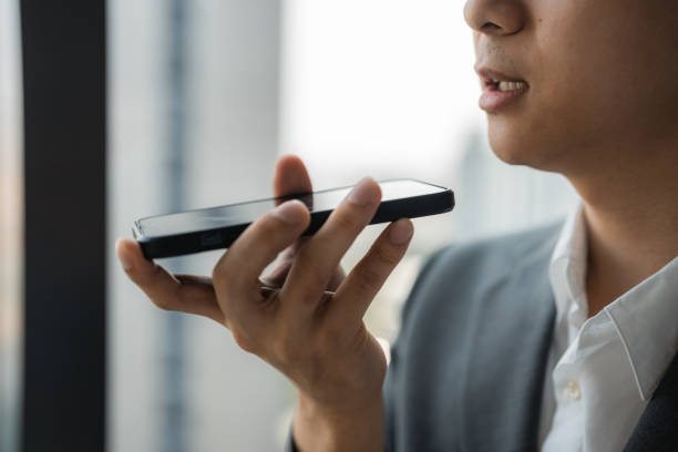 istock Confident business woman speaking on her smartphone in speaker mode 2198012650