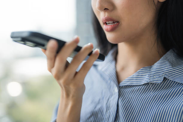 istock Confident business woman speaking on her smartphone in speaker mode 2198012724