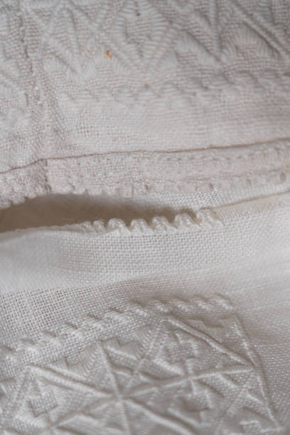 istock Handcrafted embroidery work on white fabric showcasing intricate patterns and needle artistry in a serene environment 2198012982