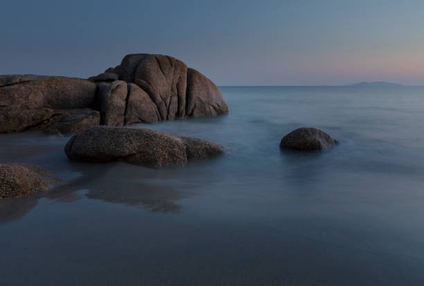 Rocks on Lanzada beach, Pontevedra at dusk