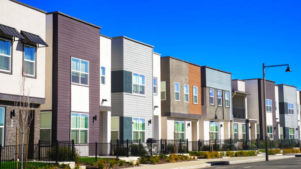 istock Row of small single family homes 2198025499