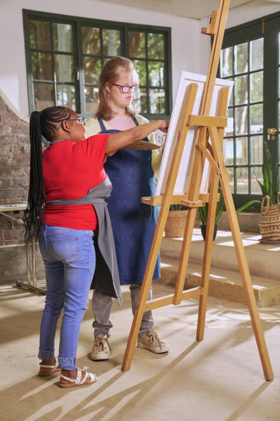 istock Disabled women painting in art studio 2198025978