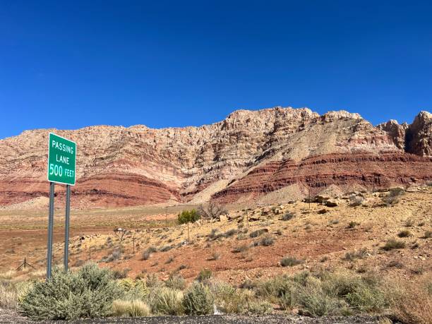 istock Empty Highway with Red Rock Formations in Arizona 2198027096