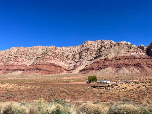 istock Empty Highway with Red Rock Formations in Arizona 2198027117