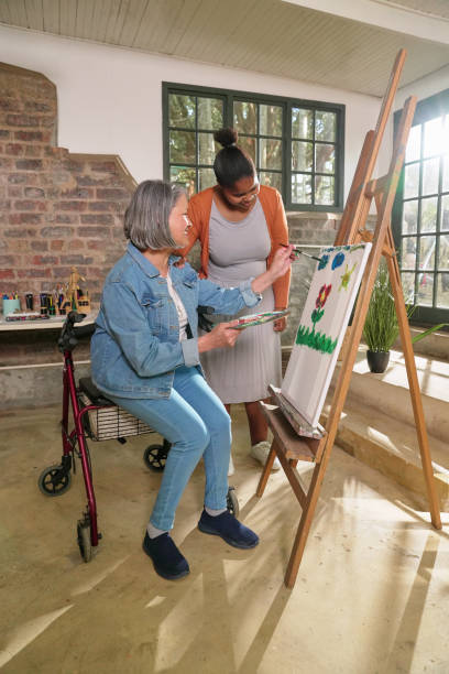istock Disabled women painting in art studio 2198027798