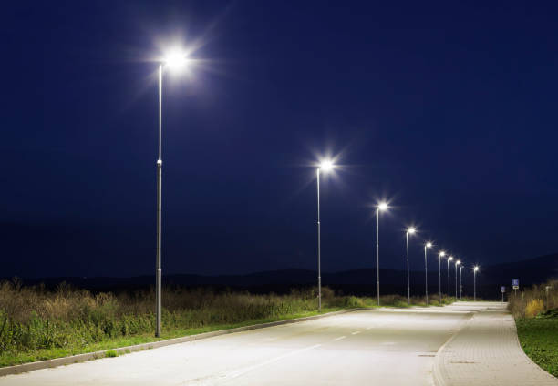 istock ight empty road with modern led street lights in industrial zone 2198030576