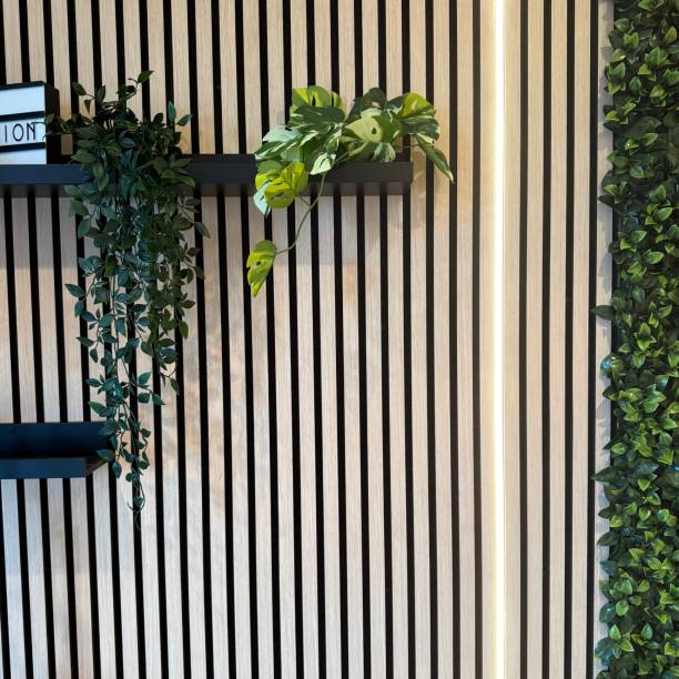 istock Studio background with wooden panels and plants 2198042121