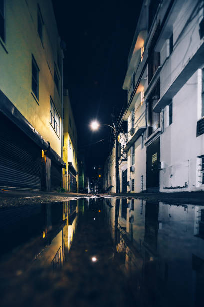 istock Dark alley reflection - Miami, Florida 2198049191