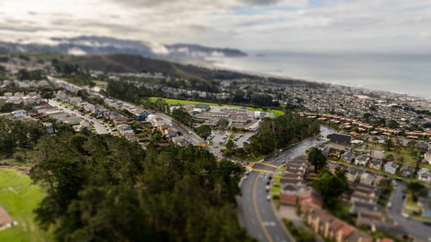 Aerial, tilt-shift view of the quaint costal town of Pacifica.