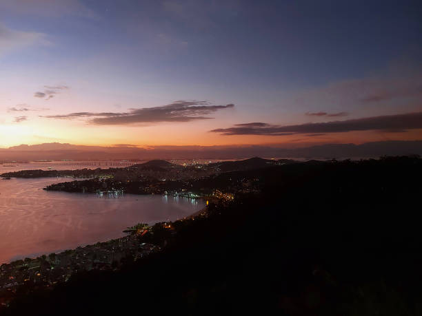 The view of twilight over the city from above.