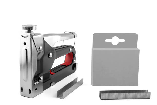 istock Iron construction stapler and box with staples isolated on white background 2198053163