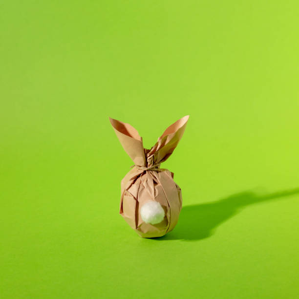 Easter bunny paper gift egg wrapping diy idea. Minimal easter pink concept