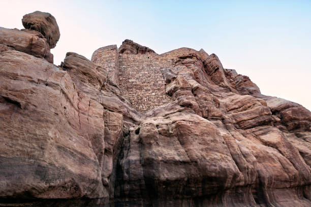 The Old Town of AlUla in Saudi Arabia is a captivating labyrinth of narrow alleyways and ancient mudbrick houses, reminiscent of a time when it thrived as a bustling trade hub. At its heart stands the historic AlUla Fort, believed to be the oldest structure in the area, overlooking the town with its centuries-old presence. Today, the Old Town welcomes visitors with its charming blend of heritage and modernity, offering a delightful array of cafés, restaurants.
