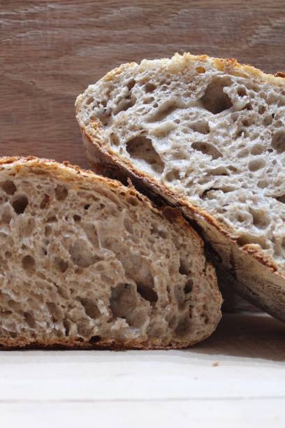 istock Two halves of a sourdough loaf 2198062636