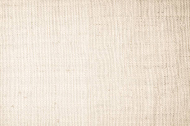 istock Brown sackcloth woven texture background in natural pattern. Jute hessian burlap, linen background in light beige cream color blank. Weaving canvas fiber line cotton cloth textured as organic. 2198064532