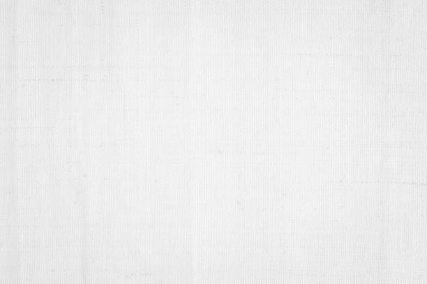 istock White color fabric canvas woven texture background in pattern light blank. Natural gauze linen, carpet wool and cotton cloth textile textured as clean empty for decoration text. Grey sack material. 2198064549
