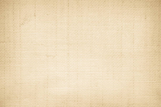 Cream abstract Hessian or sackcloth fabric or hemp sack texture background. Wallpaper of artistic wale linen canvas. Blanket or Curtain of cotton pattern with copy space for text decoration.