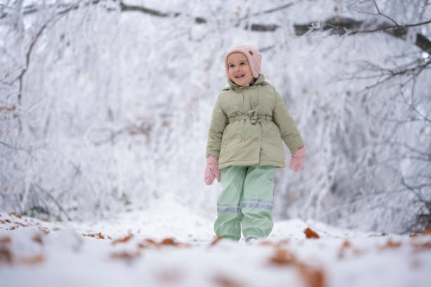 istock Snow Fun in First Snow for Kids. Child Winter Activities 2198064677