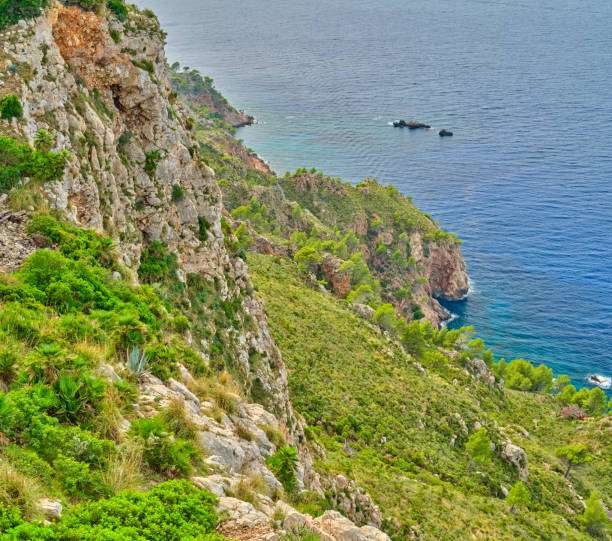 Serra de Tramuntana, Mallorca, Spain.  In 2011, UNESCO World Heritage Site status was awarded to Mallorcaâs magnificent Serra de Tramuntana. This impressive mountain range â almost 90km long â forms the backbone of Mallorca, and stretches from Andratx in the southwest to the Cap de Formentor in the far north of the island.