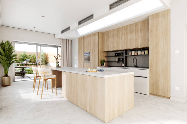 istock Bright Contemporary Kitchen with Large Island and Outdoor View 2198066841