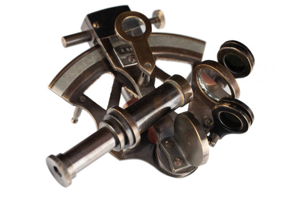 Antique bronze sextant isolated on white background