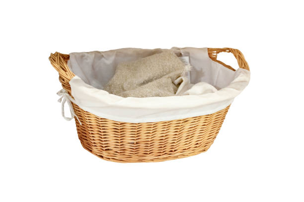 istock Cloth In Wicker Basket Isolated On White Background. 2198076604
